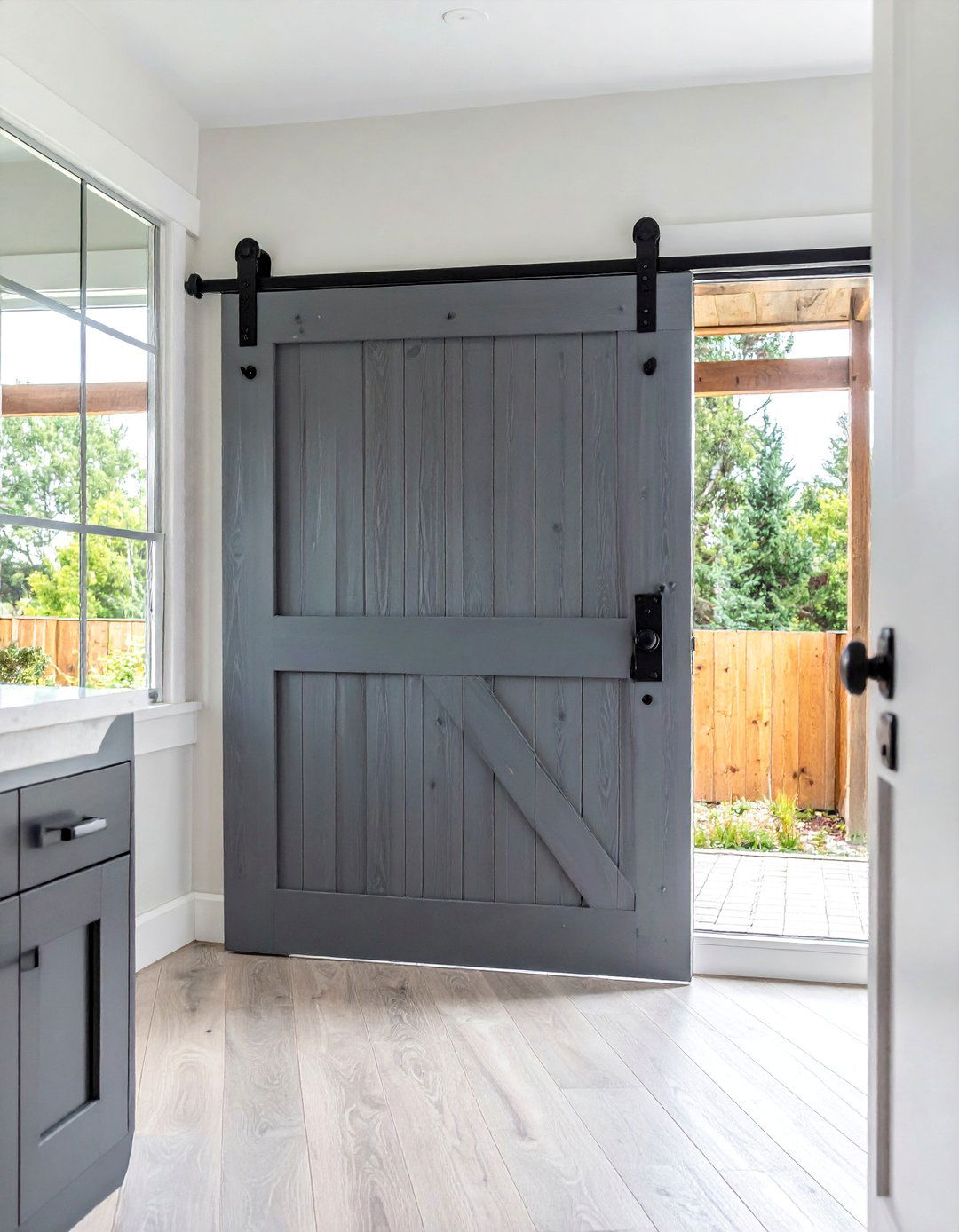 Barnwood Gray Barn Door with Black Iron Hardware - 25 Bathroom Barn Door Ideas