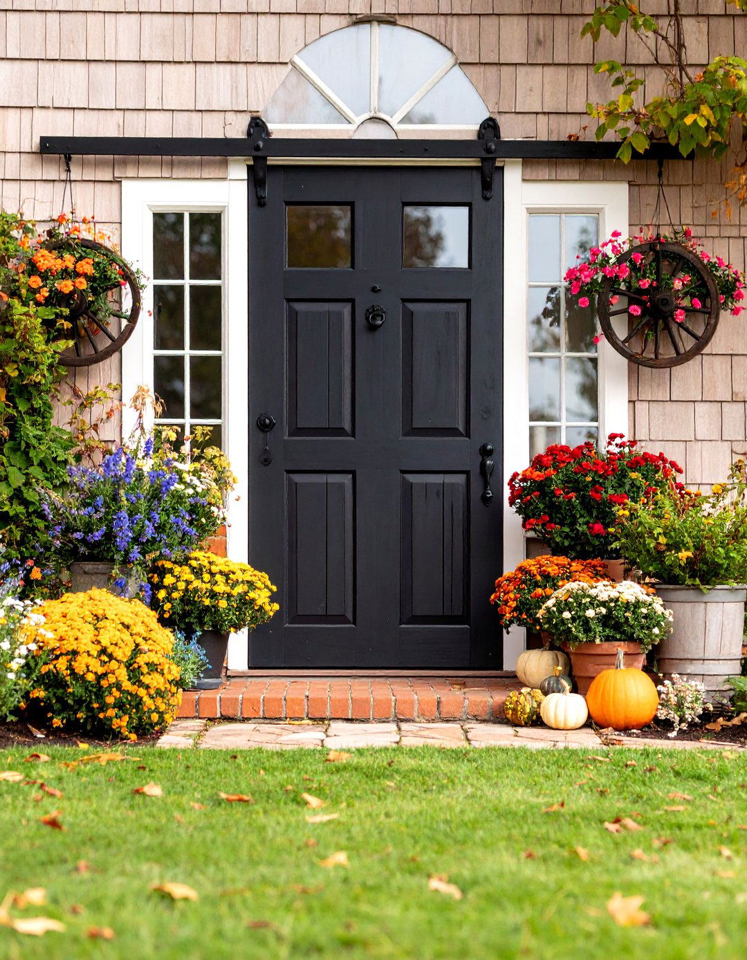 Black Dutch Colonial Door with Barn Hardware - 25 Black Front Door Ideas