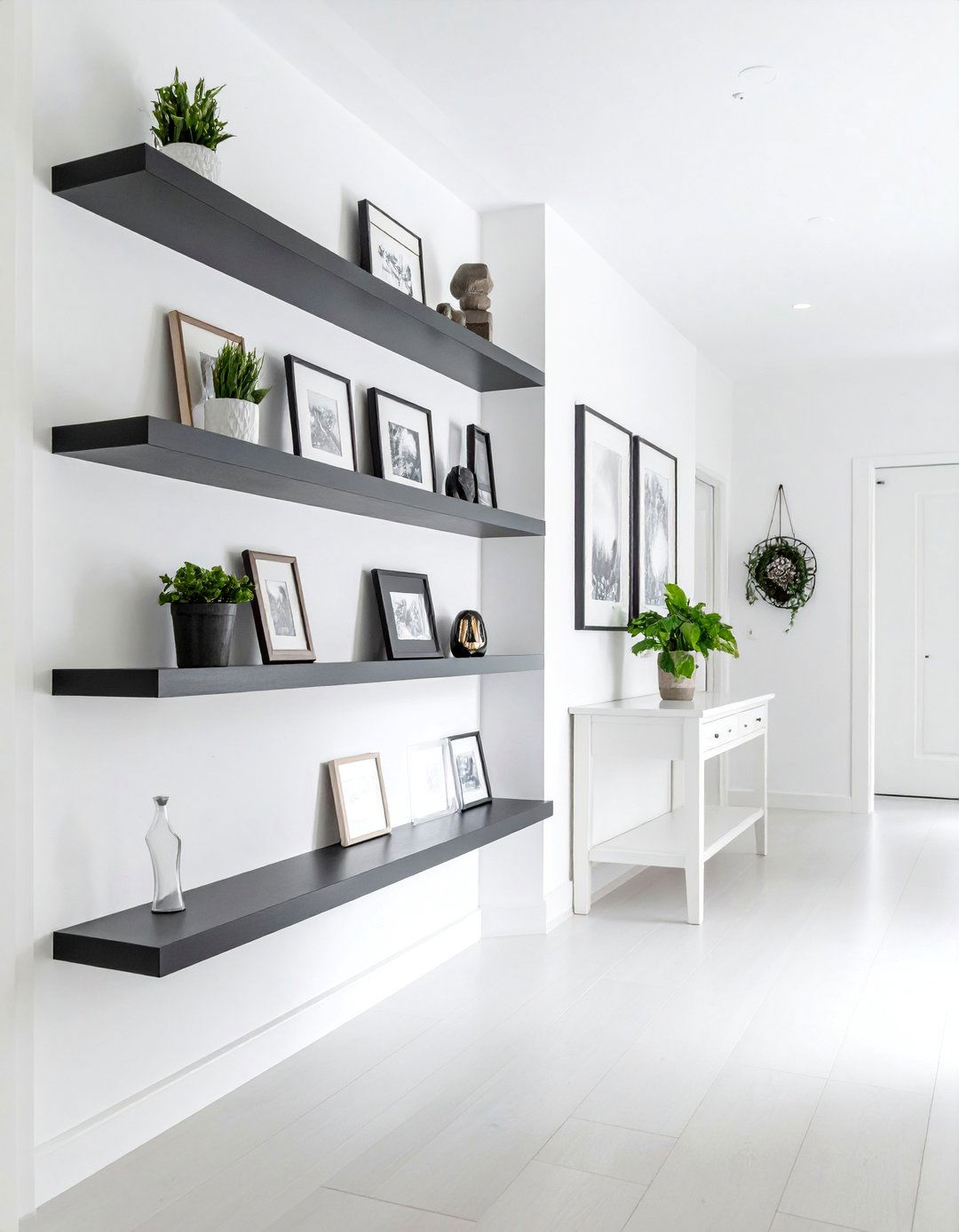 Black Picture Ledges on White Walls - 25 Black and White Entryway Design Ideas