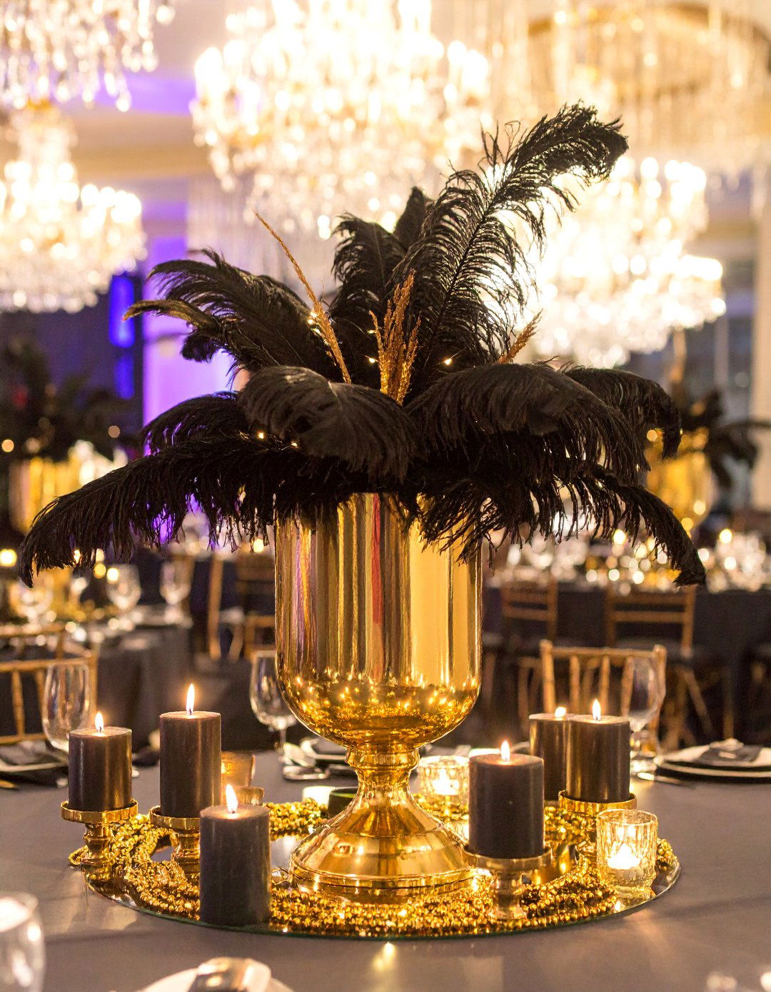 Cascading Feather Fountain - 25 Black and Gold Centerpiece Ideas