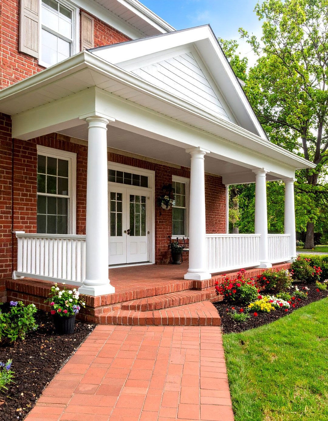 Classic Red Brick Porch with White Columns - 25 Brick Porch Ideas