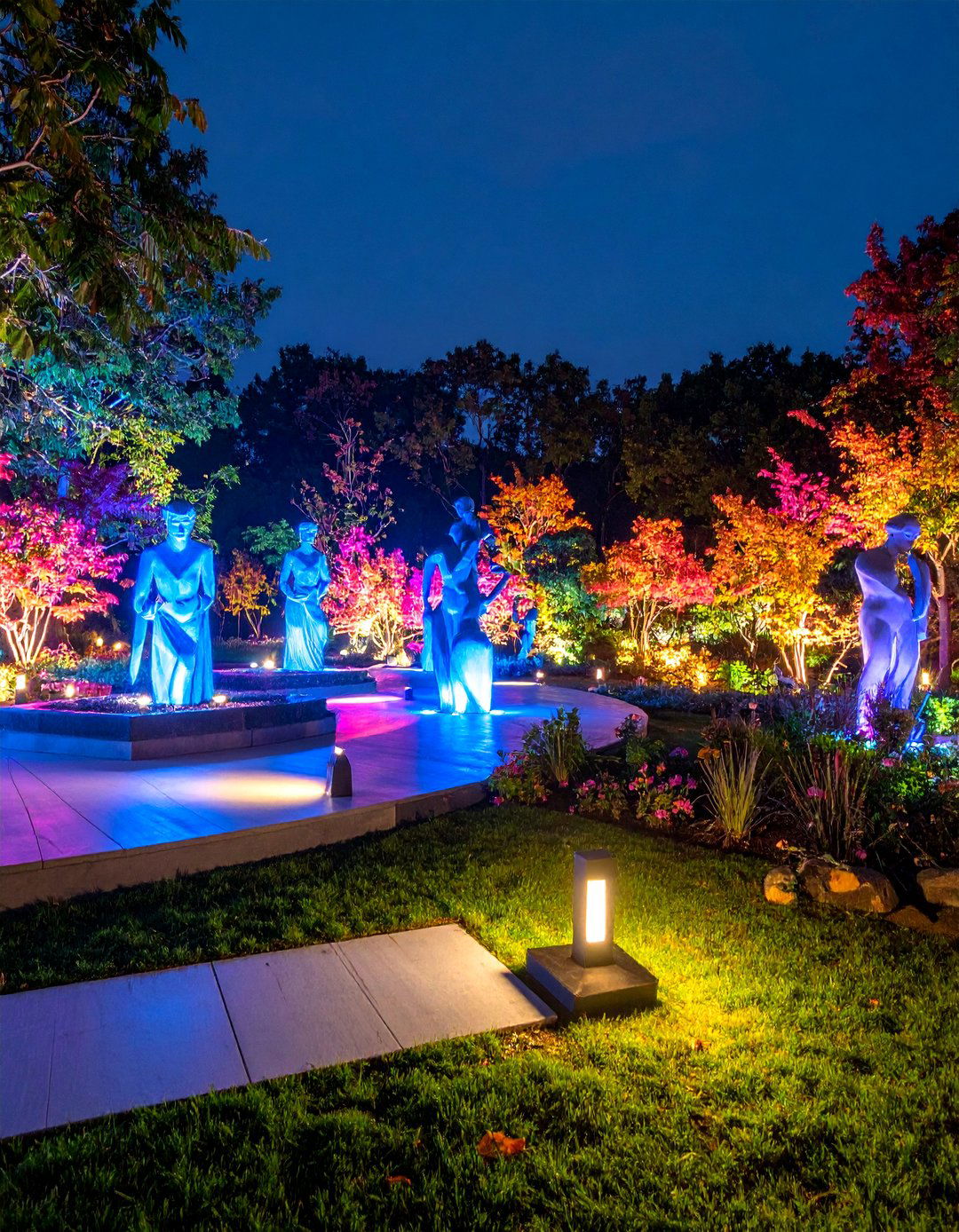 Contemporary Sculpture Garden with Precision Spotlighting - 25 Landscape Lighting Ideas