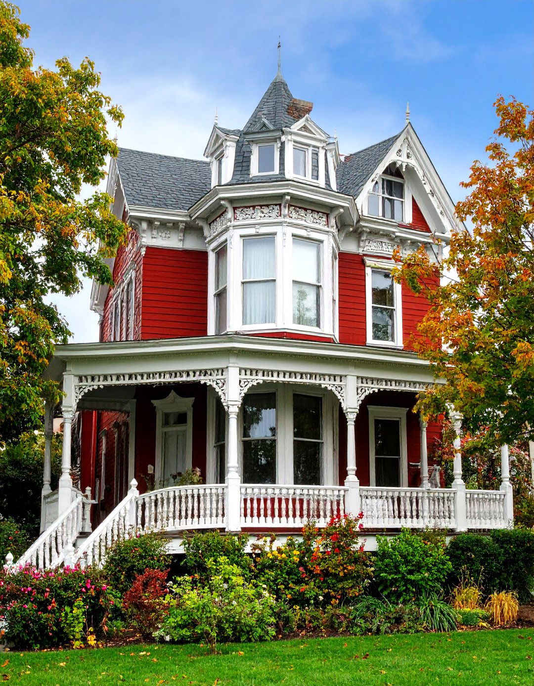 Dark Red Victorian with Ornate Trim Details - 25 Dark Red House Exterior Ideas