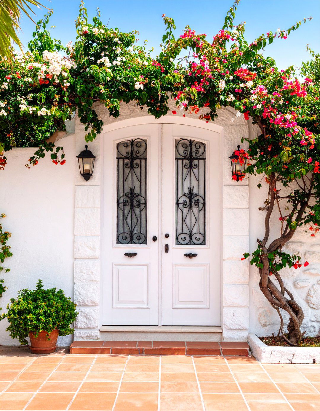 Distressed White Door with Iron Grille - 25 Mediterranean Front Door Ideas