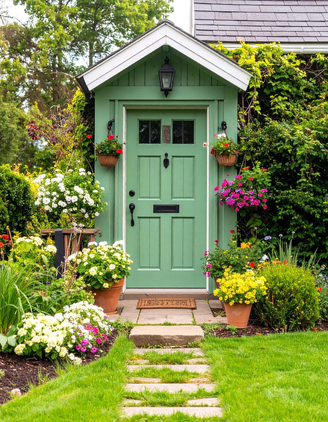 Dutch Door with Cottage Garden Styling - 25 Colonial Front Door Ideas