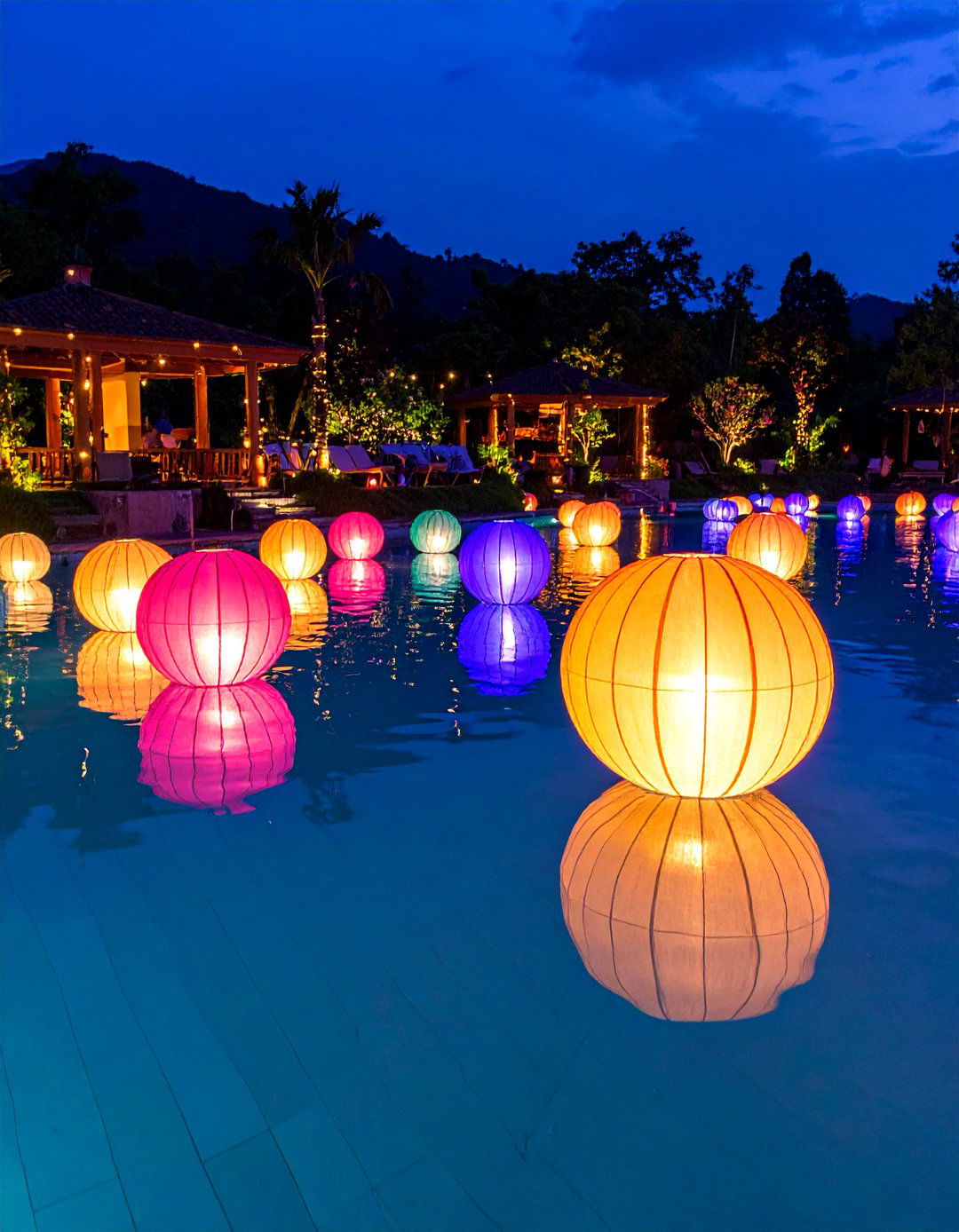 Floating LED Pool Orbs for Dynamic Displays - 25 Pool Lighting Ideas