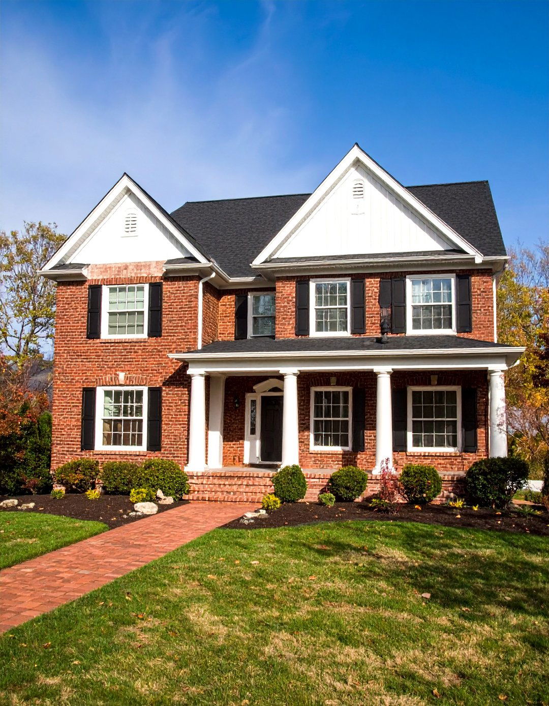 Georgian Colonial with Chocolate Brown Brick and White Columns - 25 Chocolate Brown House Exterior Design Ideas