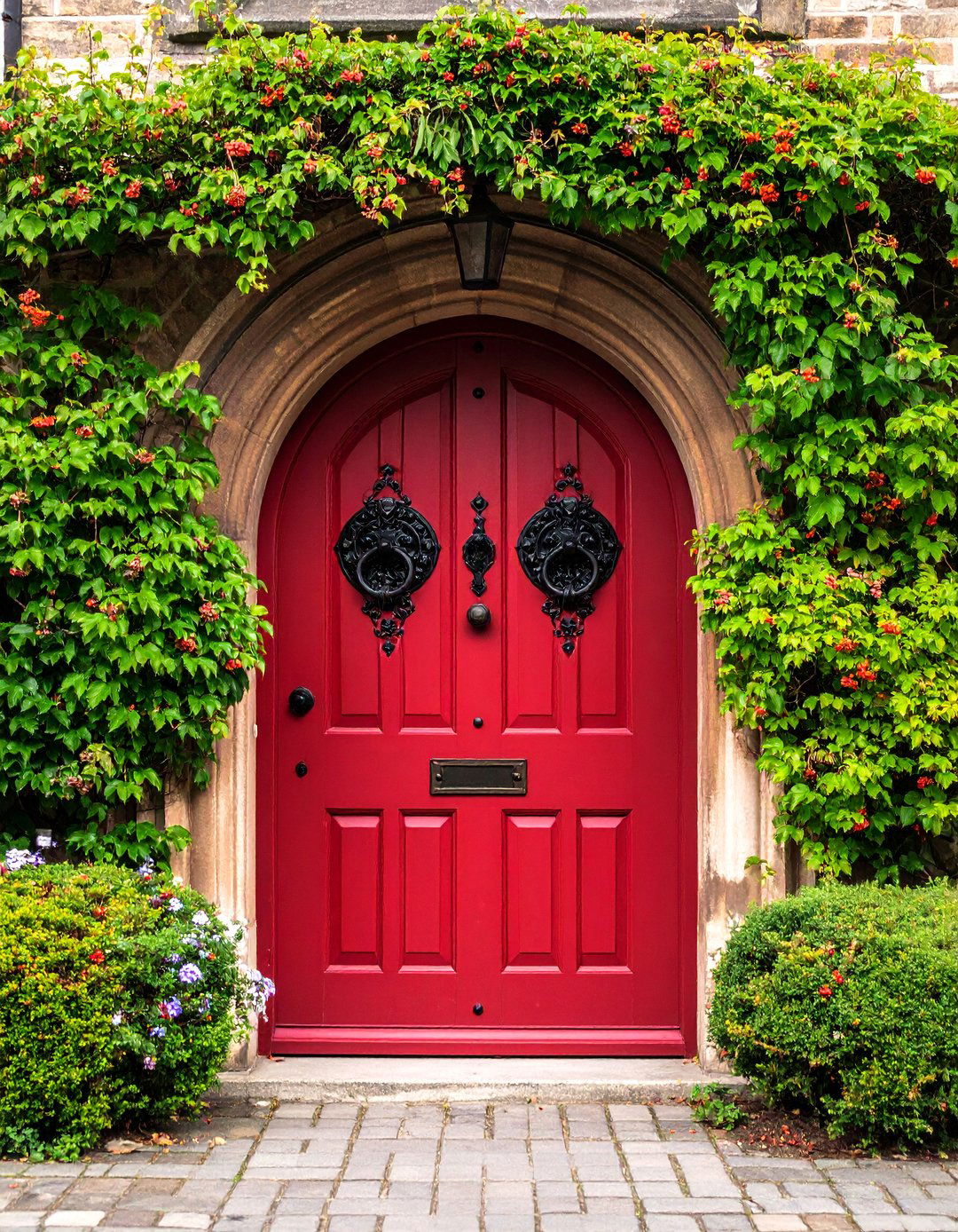 Maroon Red Door with English Tudor Hardware - 25 Dark Red Front Door Ideas