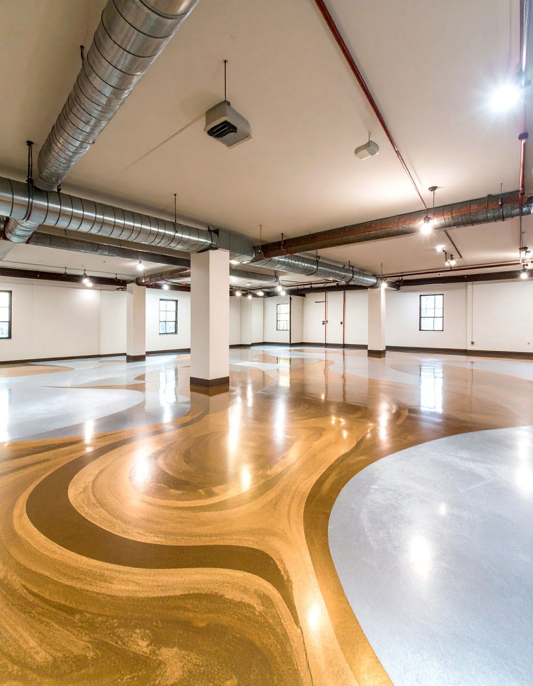Metallic Epoxy Concrete Basement Floor with Swirl Patterns - 25 Concrete Basement Floor Ideas
