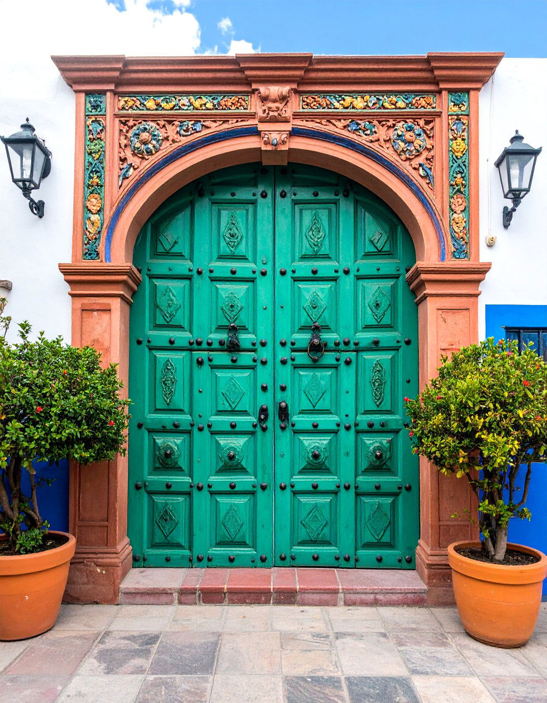 Mexican Style with Carved Wooden Doors - 25 Mexican Style House Design Ideas
