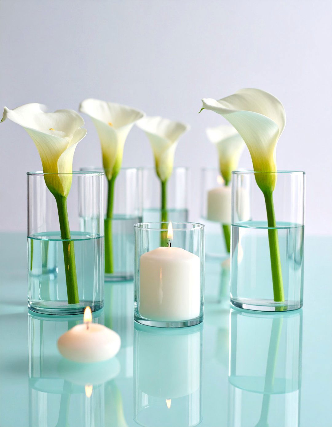 Minimalist Floating Centerpiece with Single Stem Flowers - 25 Floating Wedding Centerpiece Ideas