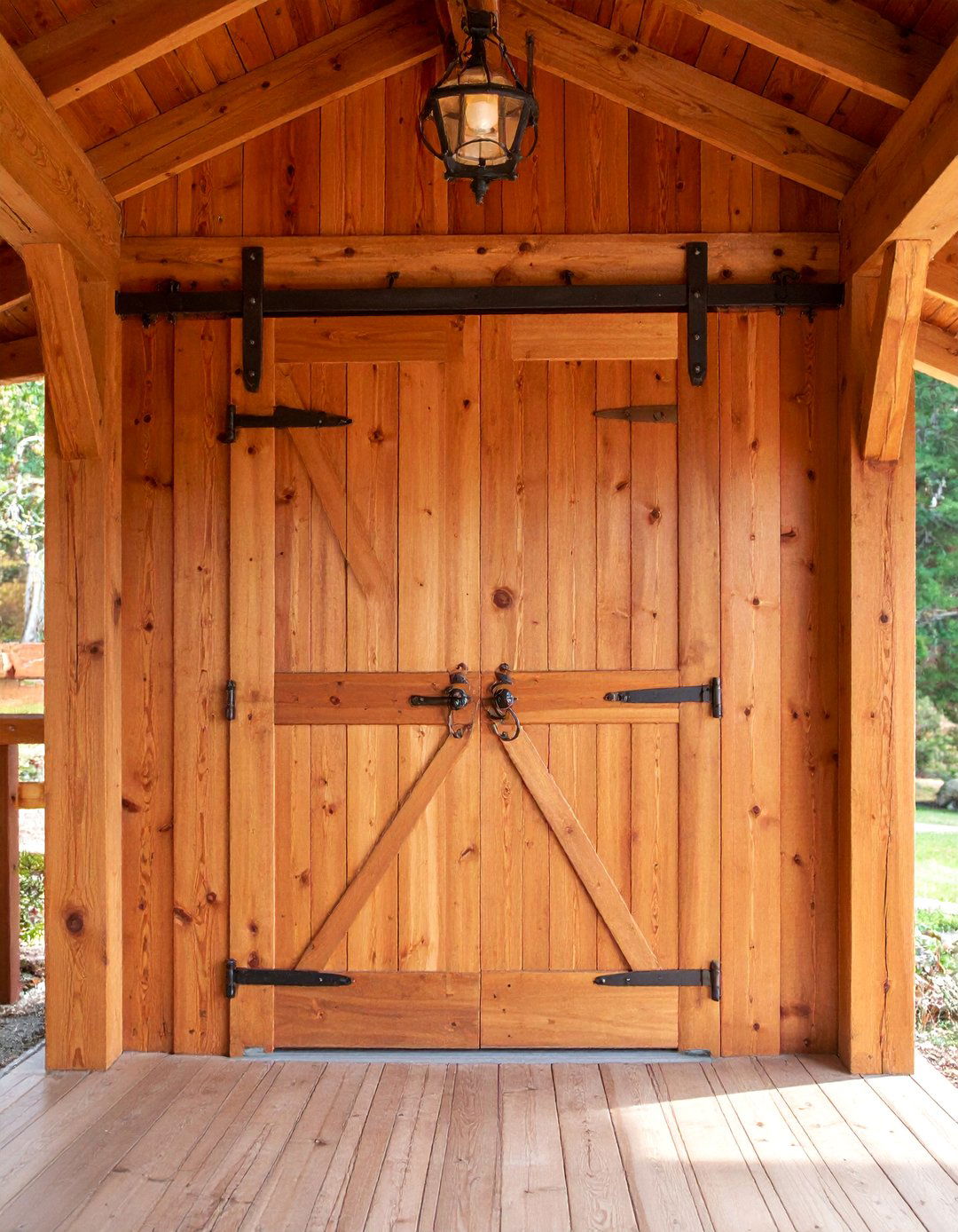 Pine Plank Door with Sliding Bolt Hardware - 25 Rustic Front Door Ideas
