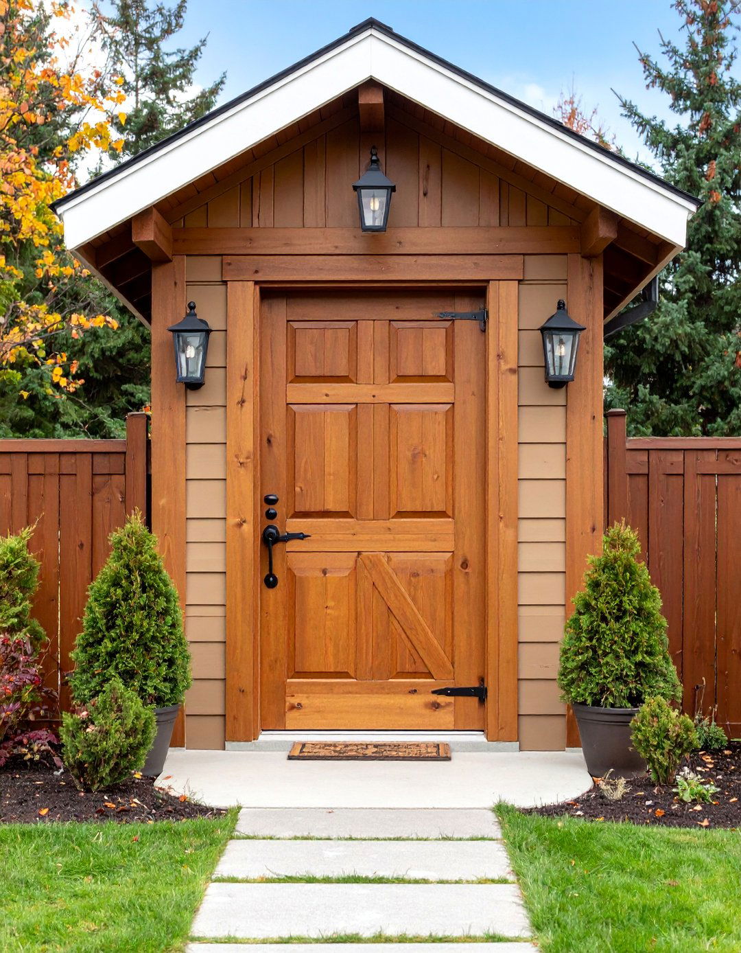 Rustic Barn Style Brown Door with Iron Hardware - 25 Brown Front Door Ideas