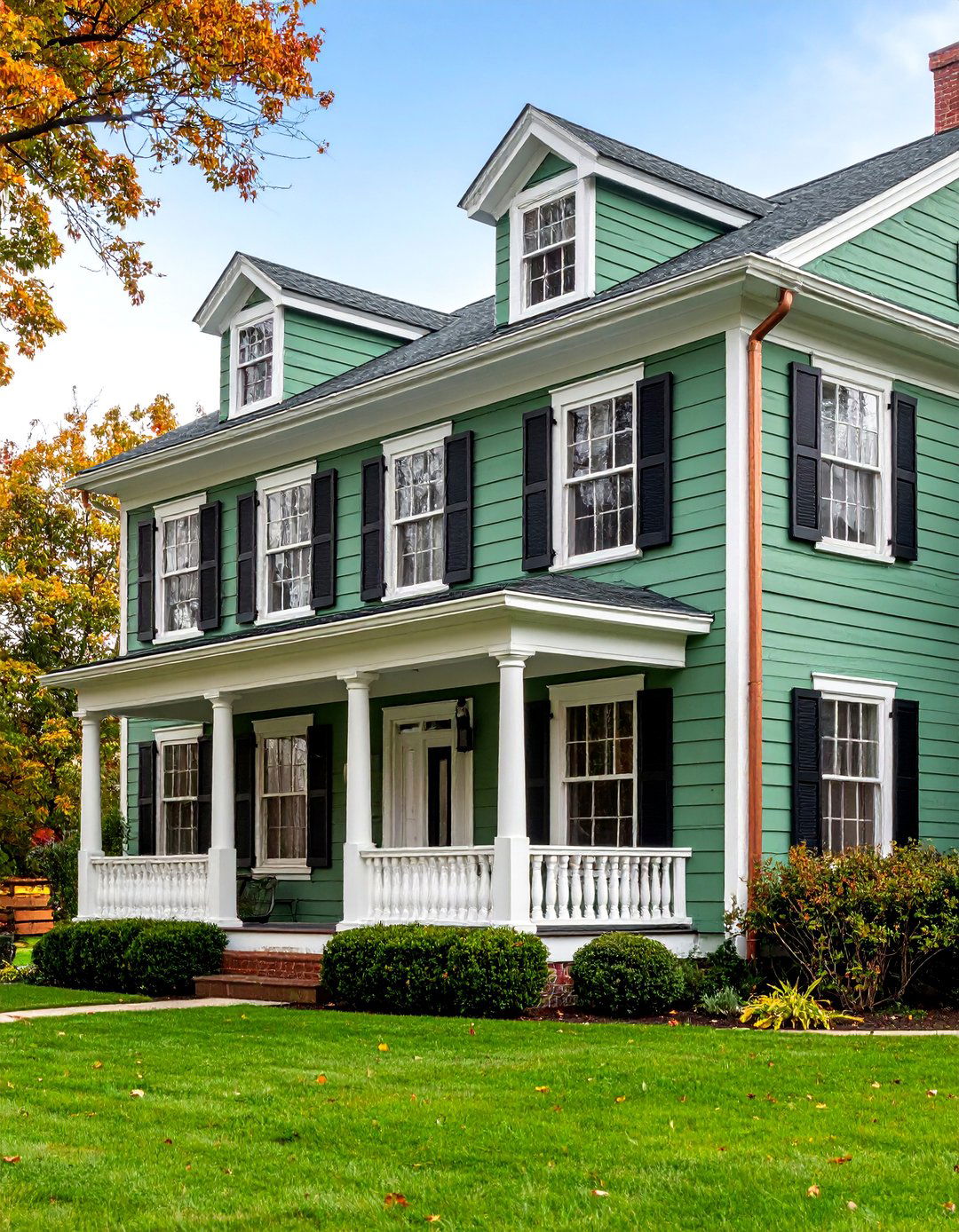 Sage Green Colonial with White Trim and Black Shutters - 25 Sage Green Painted Brick House Ideas