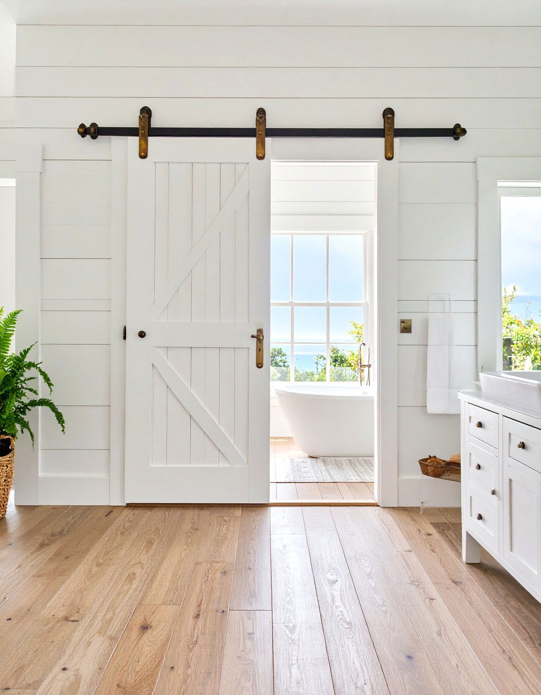 Shiplap Barn Door with Vintage Brass Hardware - 25 Bathroom Barn Door Ideas