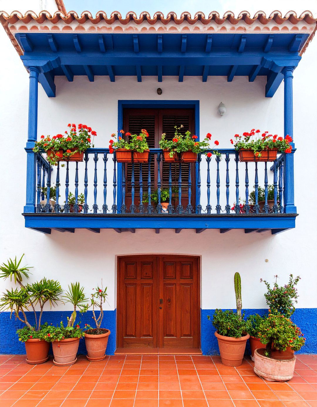 Spanish Colonial Balcony with Terra Cotta and Tile - 25 Balcony Over Garage Ideas