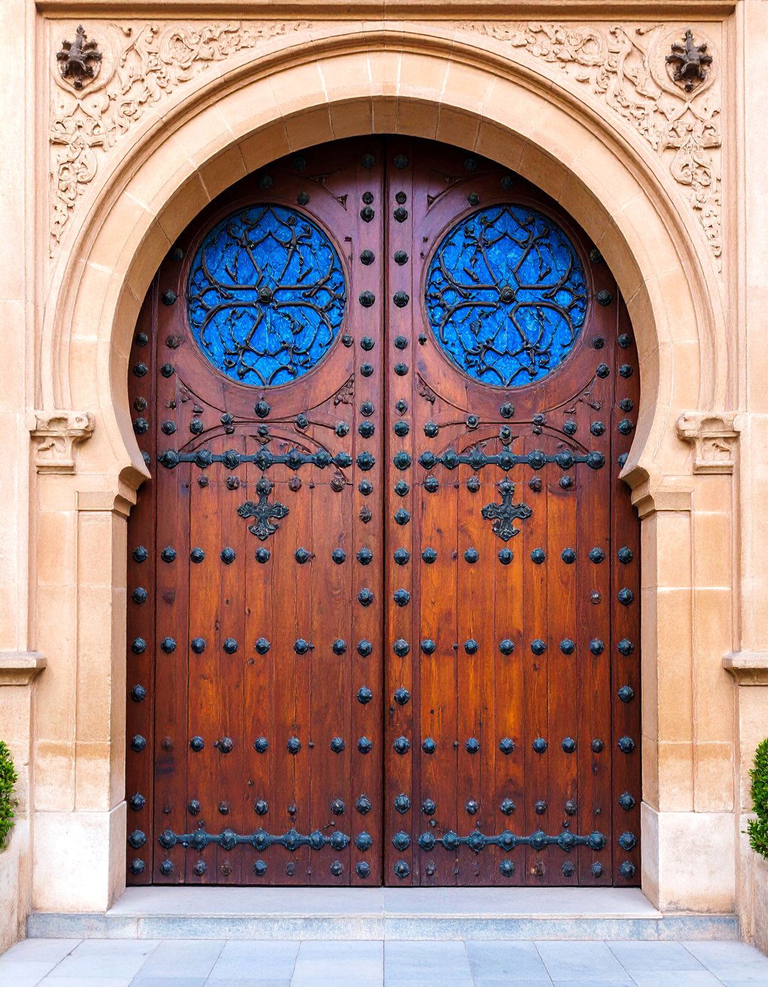 Spanish Monastery Door with Religious Motifs - 25 Spanish Style Front Door Ideas
