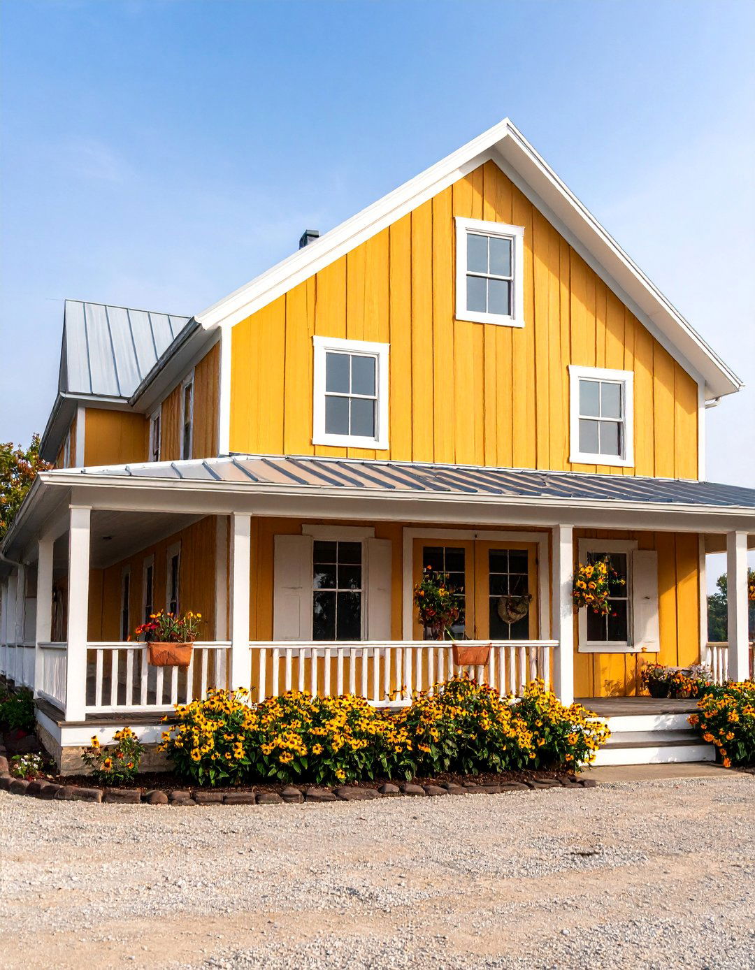 Sunflower Farmhouse with White Board and Batten Trim - 25 Yellow Exterior Home Ideas
