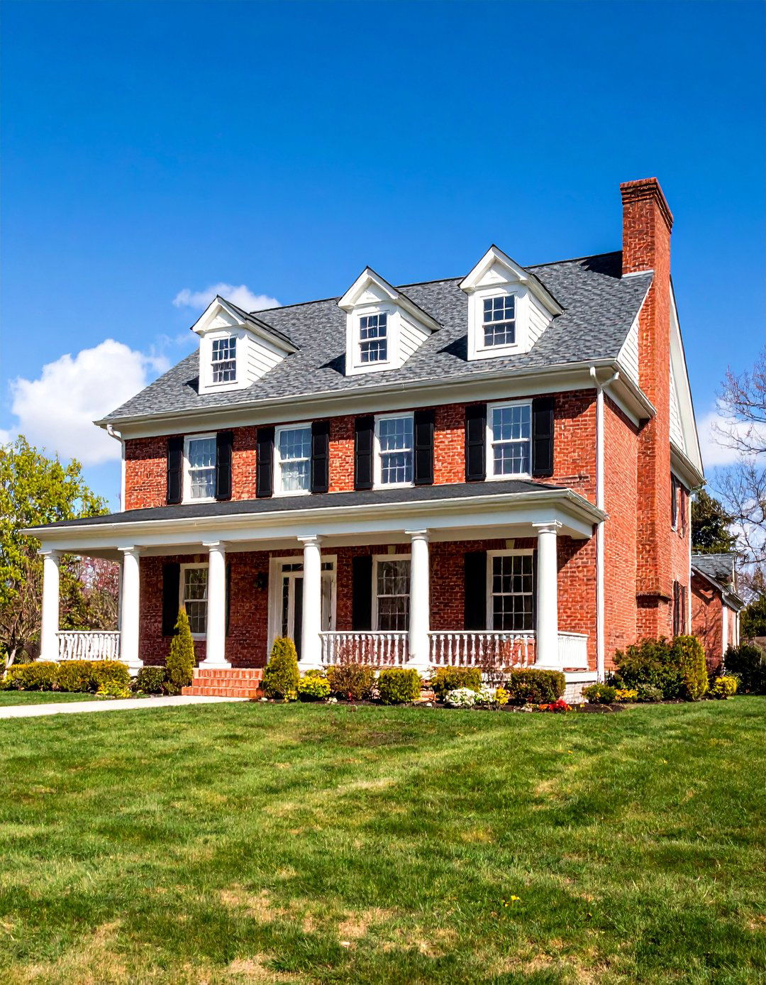 Traditional Red Brick Colonial with Limestone Accents - 25 Brick Houses With Stone Accents