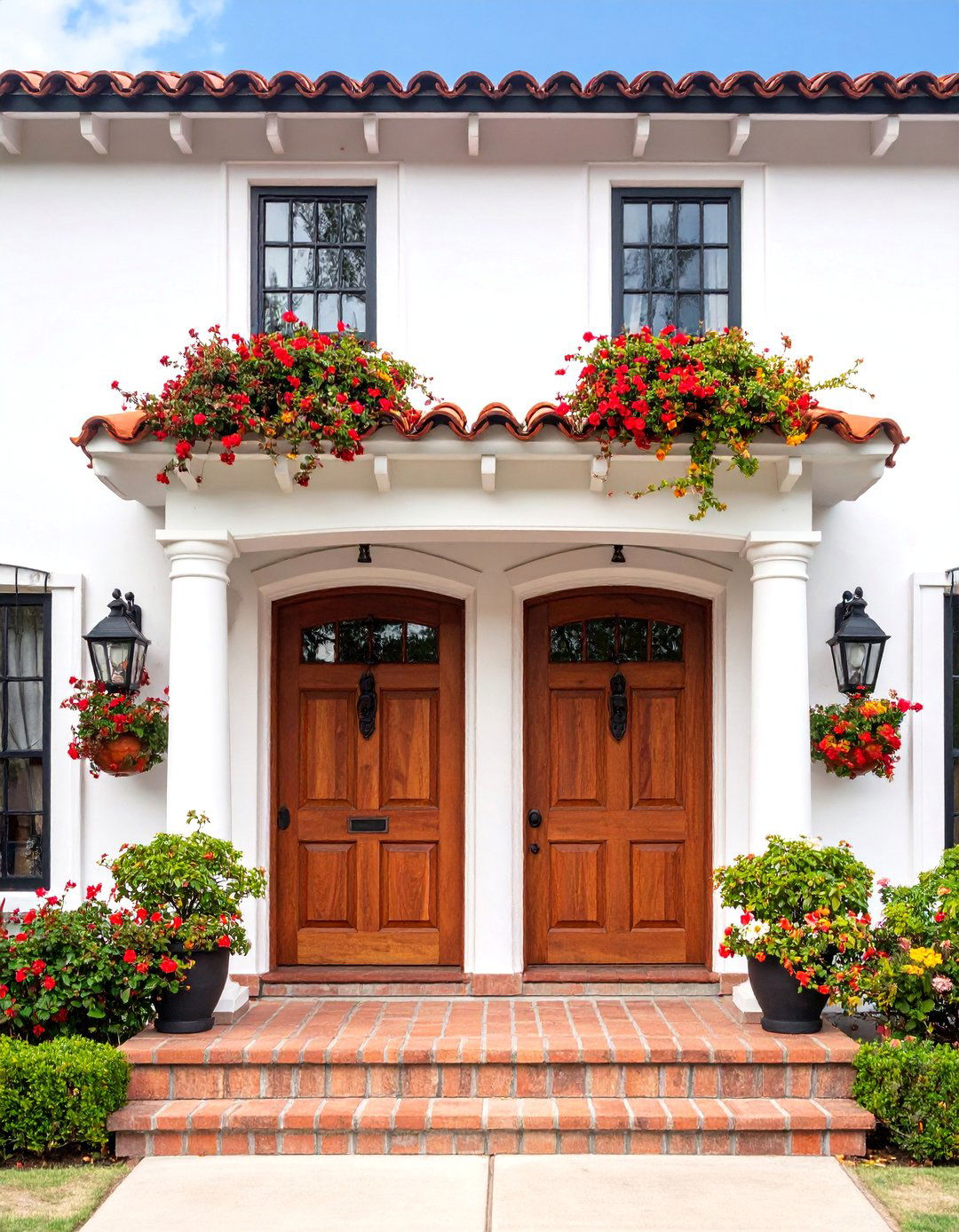 Traditional White Stucco Hacienda with Terracotta Roofing - 25 Spanish Mediterranean House Ideas