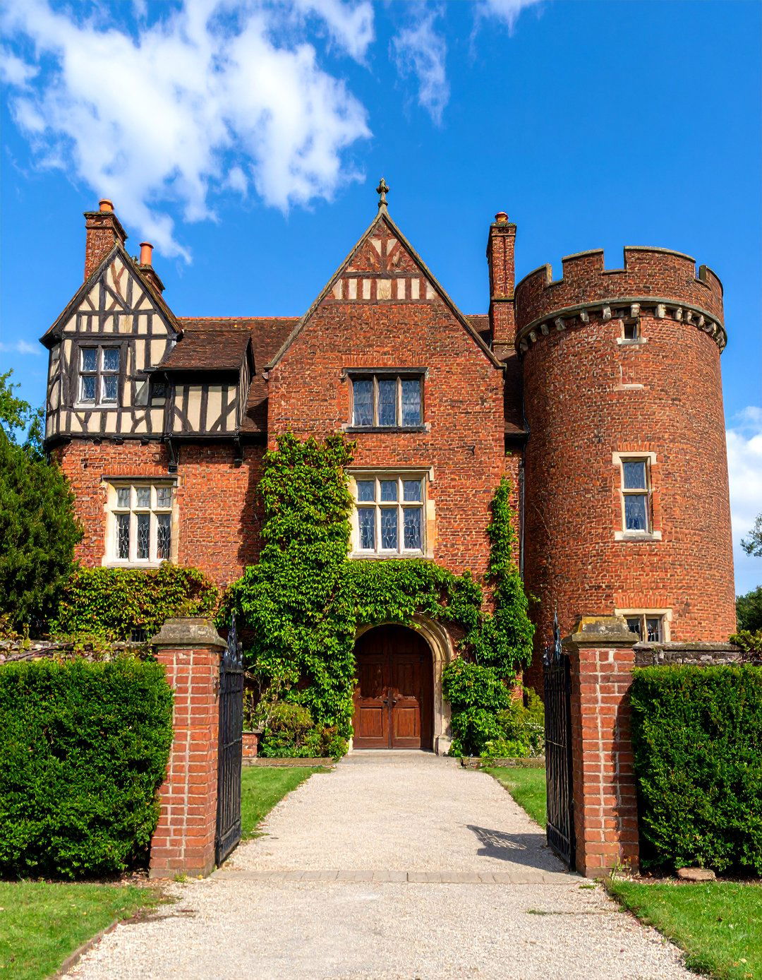 Tudor Revival Brown Brick Manor - 25 Brown Brick Exterior Home Ideas