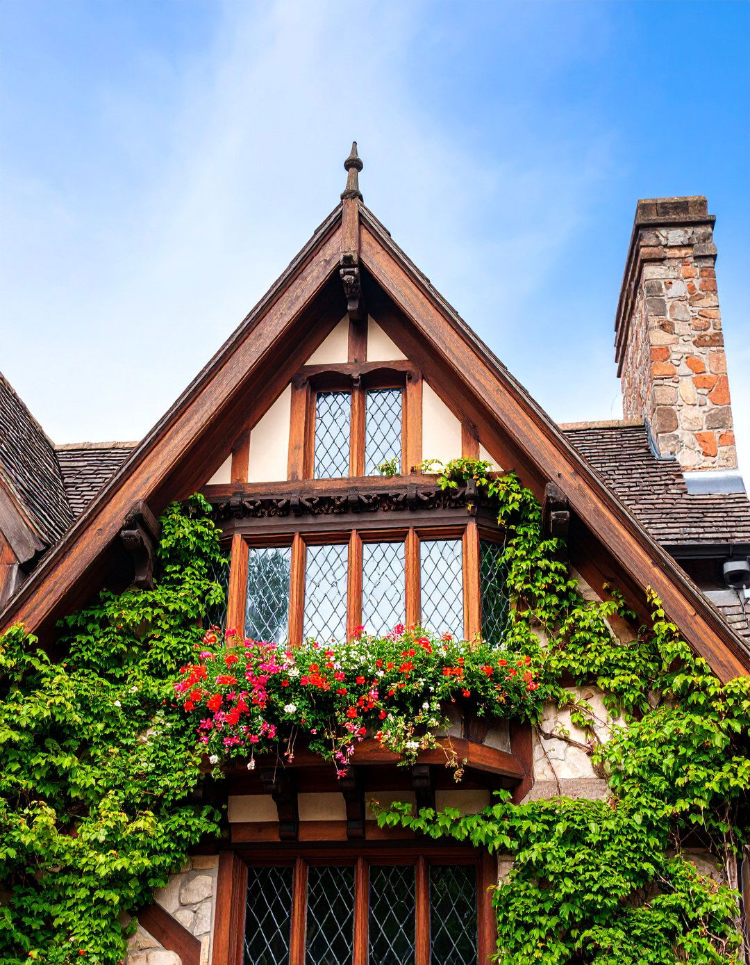 Tudor Revival Gable Dormer with Leaded Glass Windows - 25 Dormer Balcony Ideas