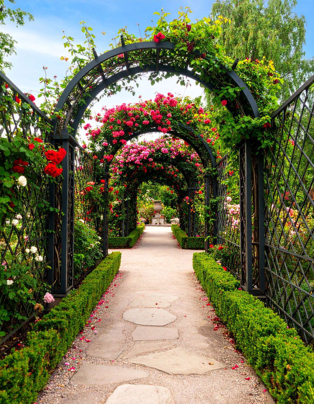 Victorian Secret Garden with Ornate Metal Trellises - 25 Secret Garden Ideas
